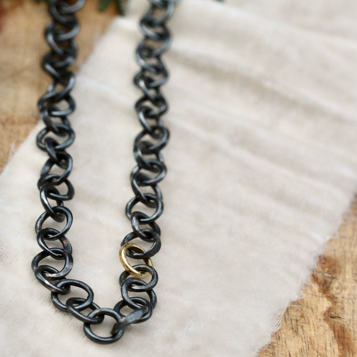 Heavy hand forged sterling silver and 18k yellow gold