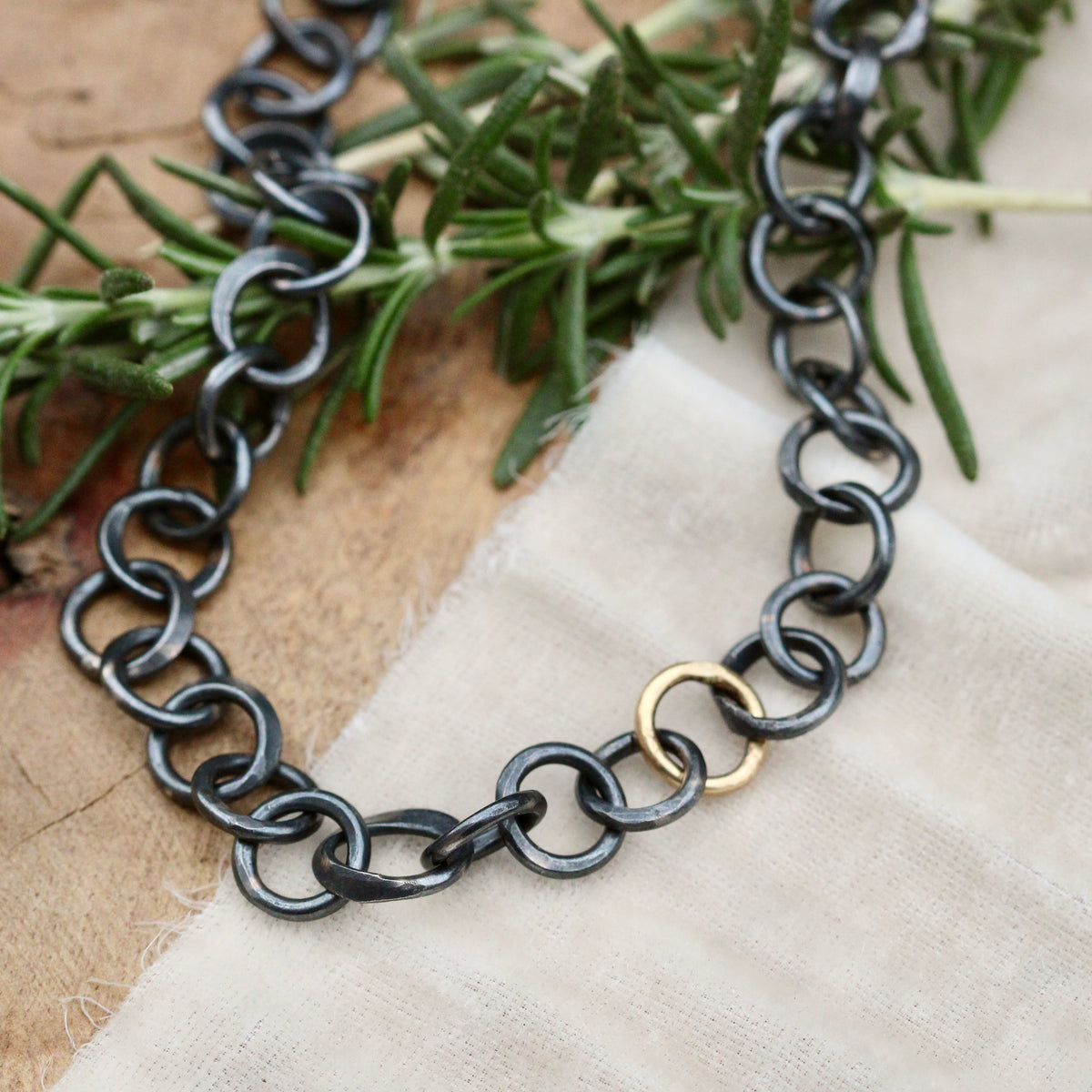 Heavy hand forged sterling silver and 18k yellow gold