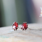 Prong set Garnet stud earrings sterling silver