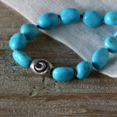 Sleeping Beauty Turquoise Necklace – Hand-Knotted on Coral Pink Silk