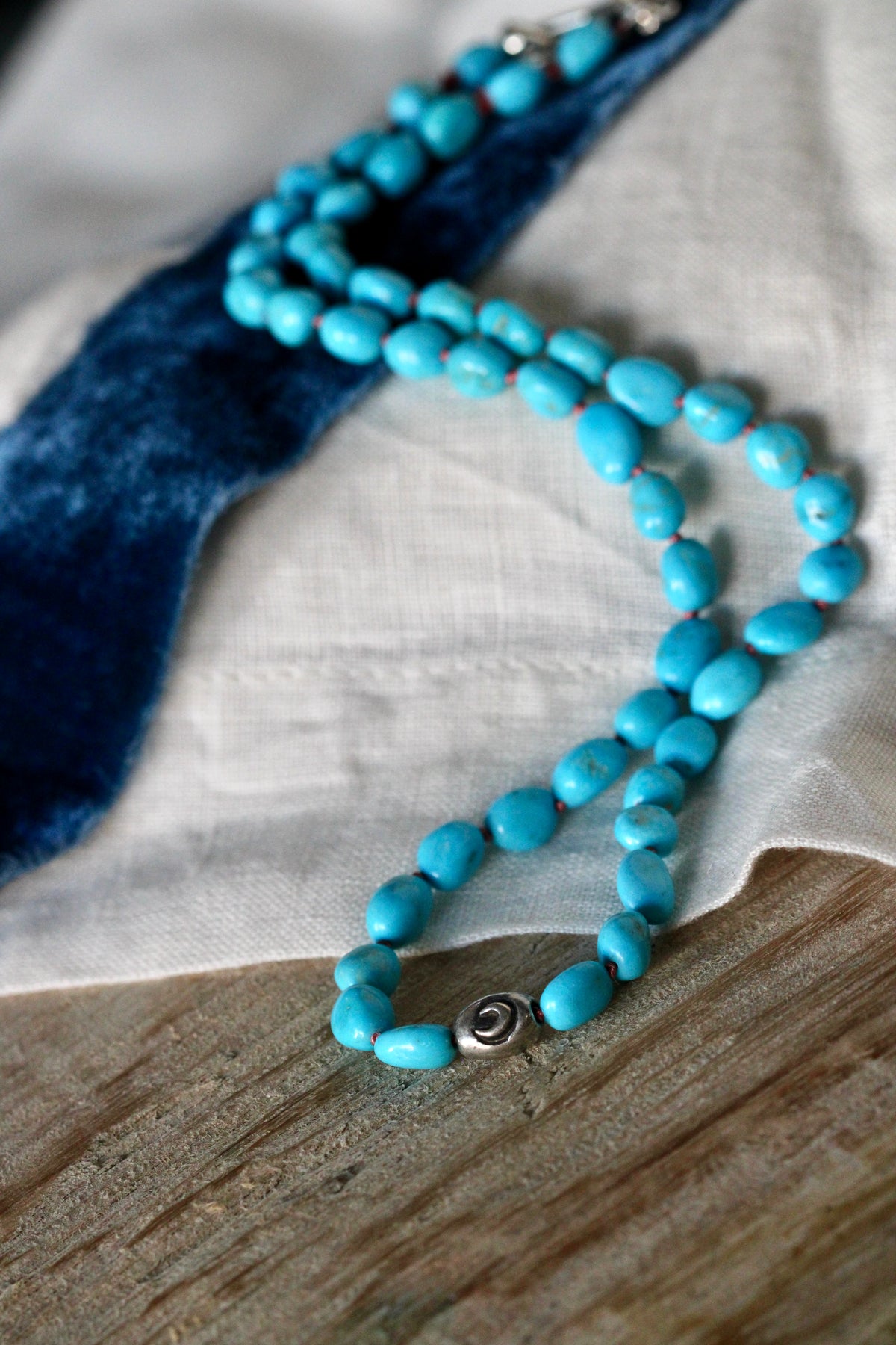 Sleeping Beauty Turquoise Necklace – Hand-Knotted on Coral Pink Silk