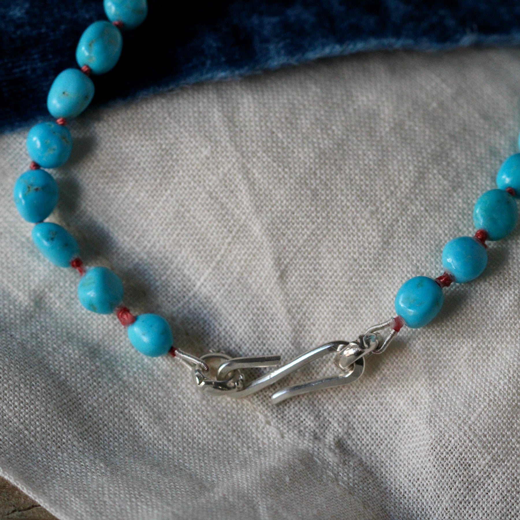 Sleeping Beauty Turquoise Necklace – Hand-Knotted on Coral Pink Silk