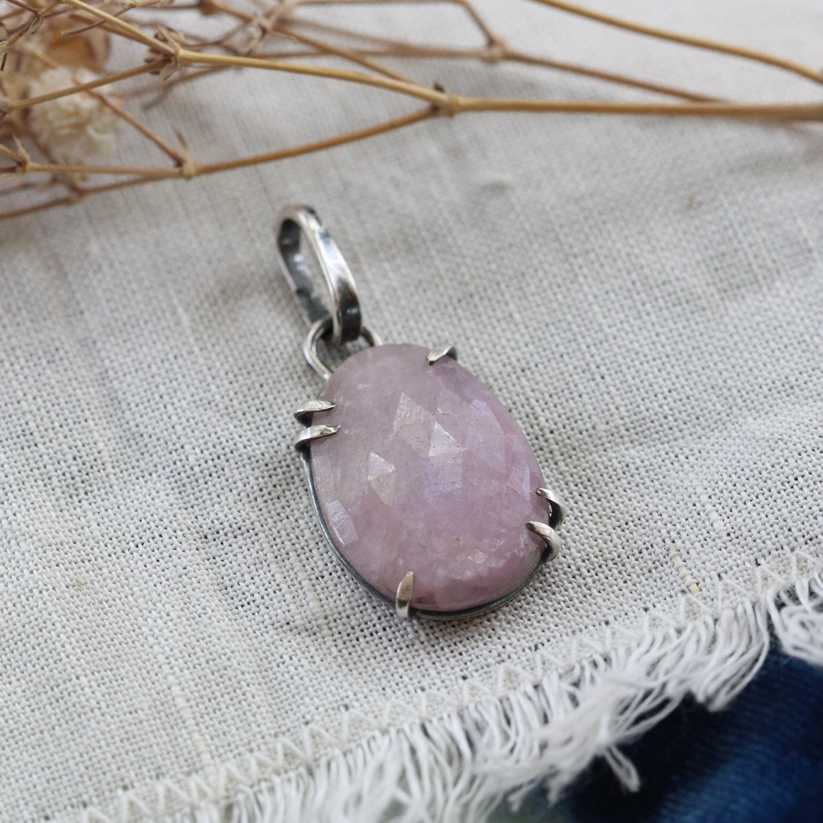 Rose cut Pink Sapphire prong set in sterling silver with heart detail