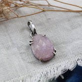 Rose cut Pink Sapphire prong set in sterling silver with heart detail