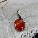 Rose cut Carnelian prong set in sterling silver with heart detail
