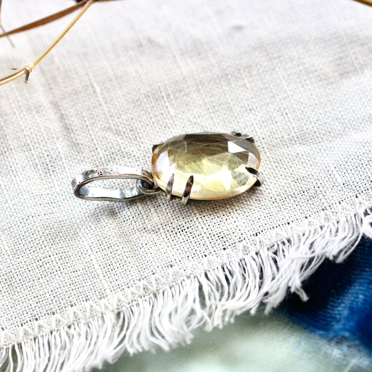 Rose cut Citrine prong set in sterling silver with heart detail