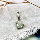 Rose cut green Sapphire prong set in sterling silver with heart detail