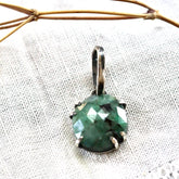 Rose cut Emerald prong set in sterling silver with heart detail