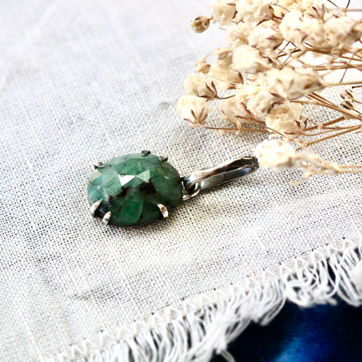 Rose cut Emerald prong set in sterling silver with heart detail