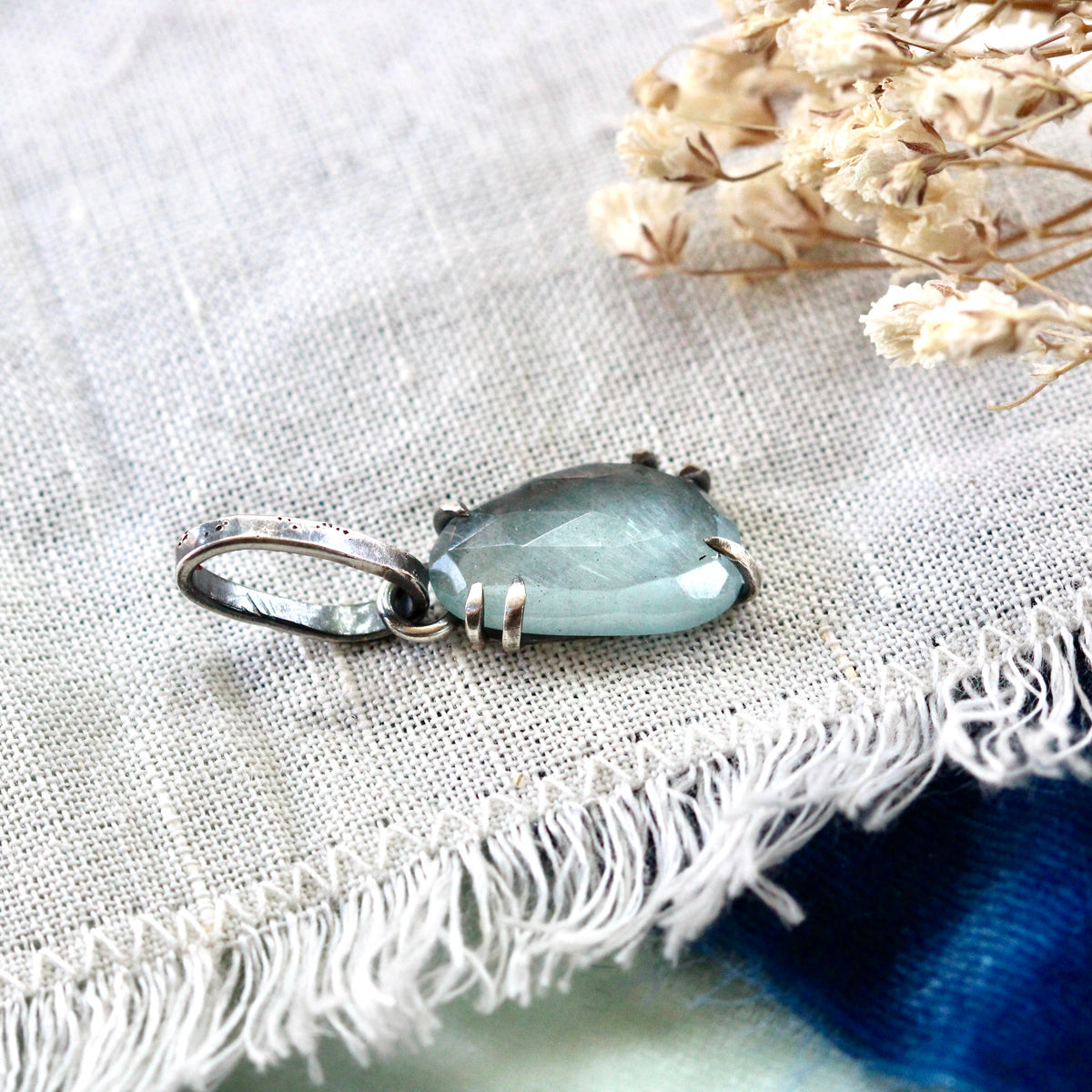 Rose cut Aquamarine prong set in sterling silver with heart detail