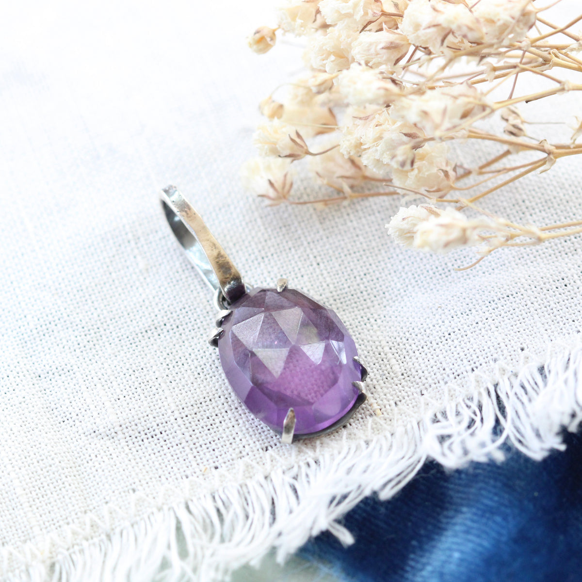 Rose cut Amethyst prong set in sterling silver with heart detail