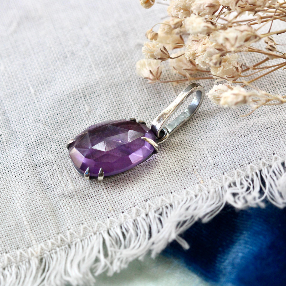 Rose cut Amethyst prong set in sterling silver with heart detail