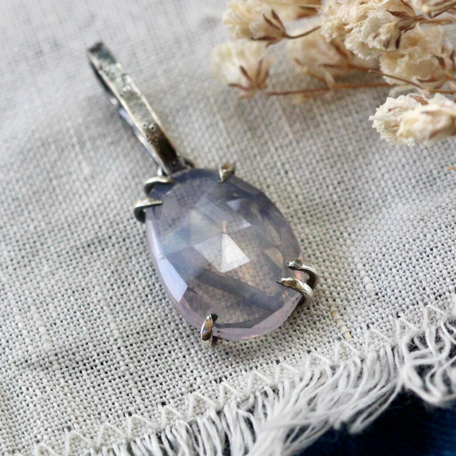 Rose cut Lavender Quartz prong set in sterling silver with heart detail