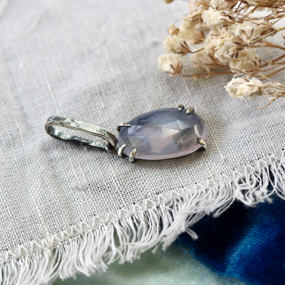 Rose cut Lavender Quartz prong set in sterling silver with heart detail