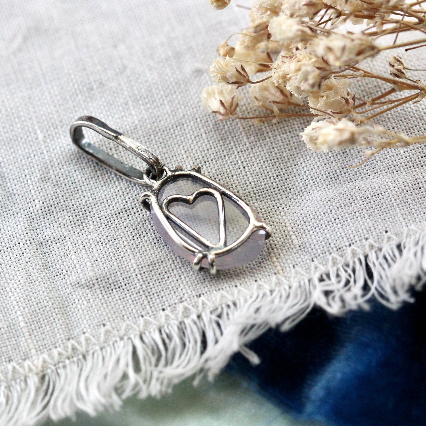 Rose cut Lavender Quartz prong set in sterling silver with heart detail