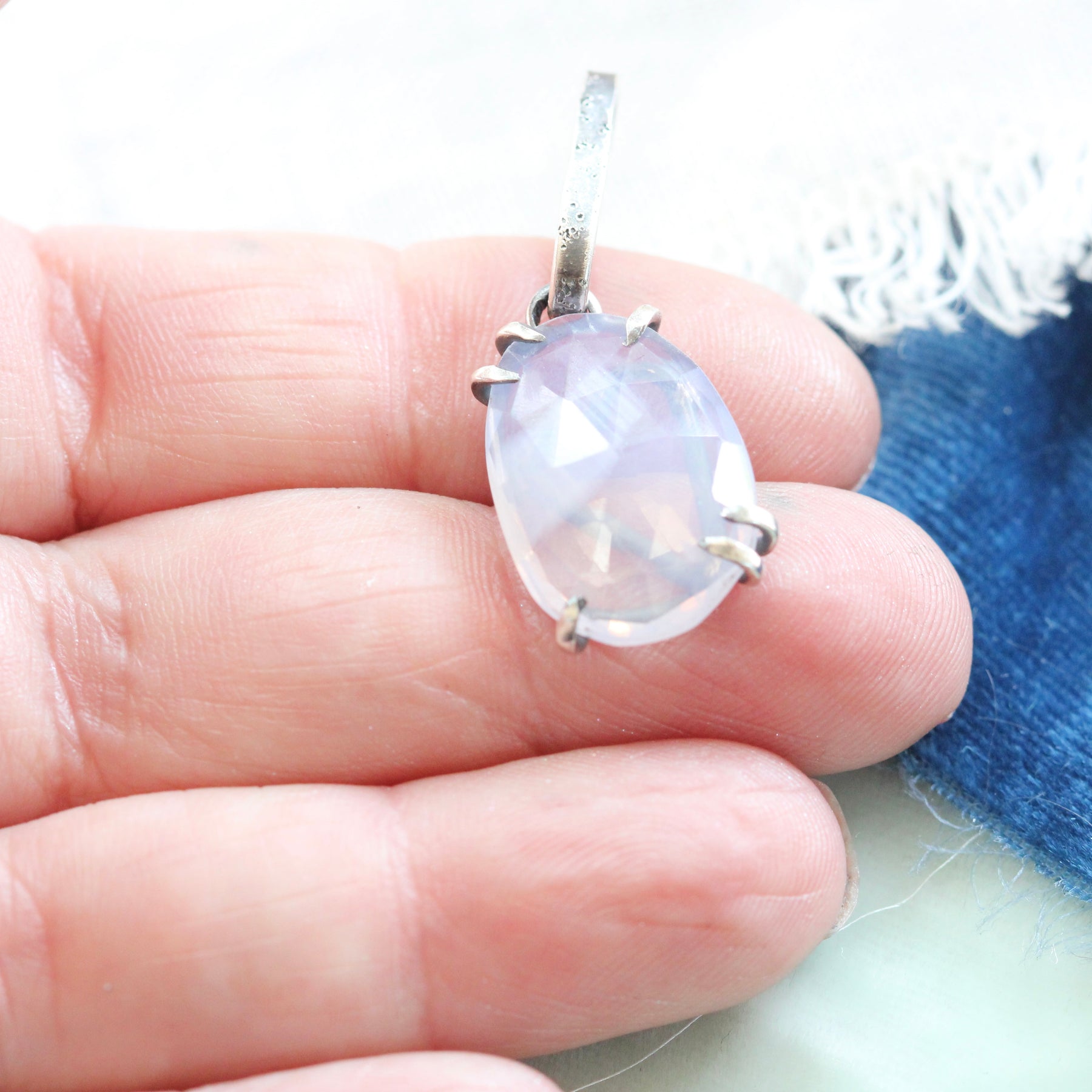 Rose cut Lavender Quartz prong set in sterling silver with heart detail