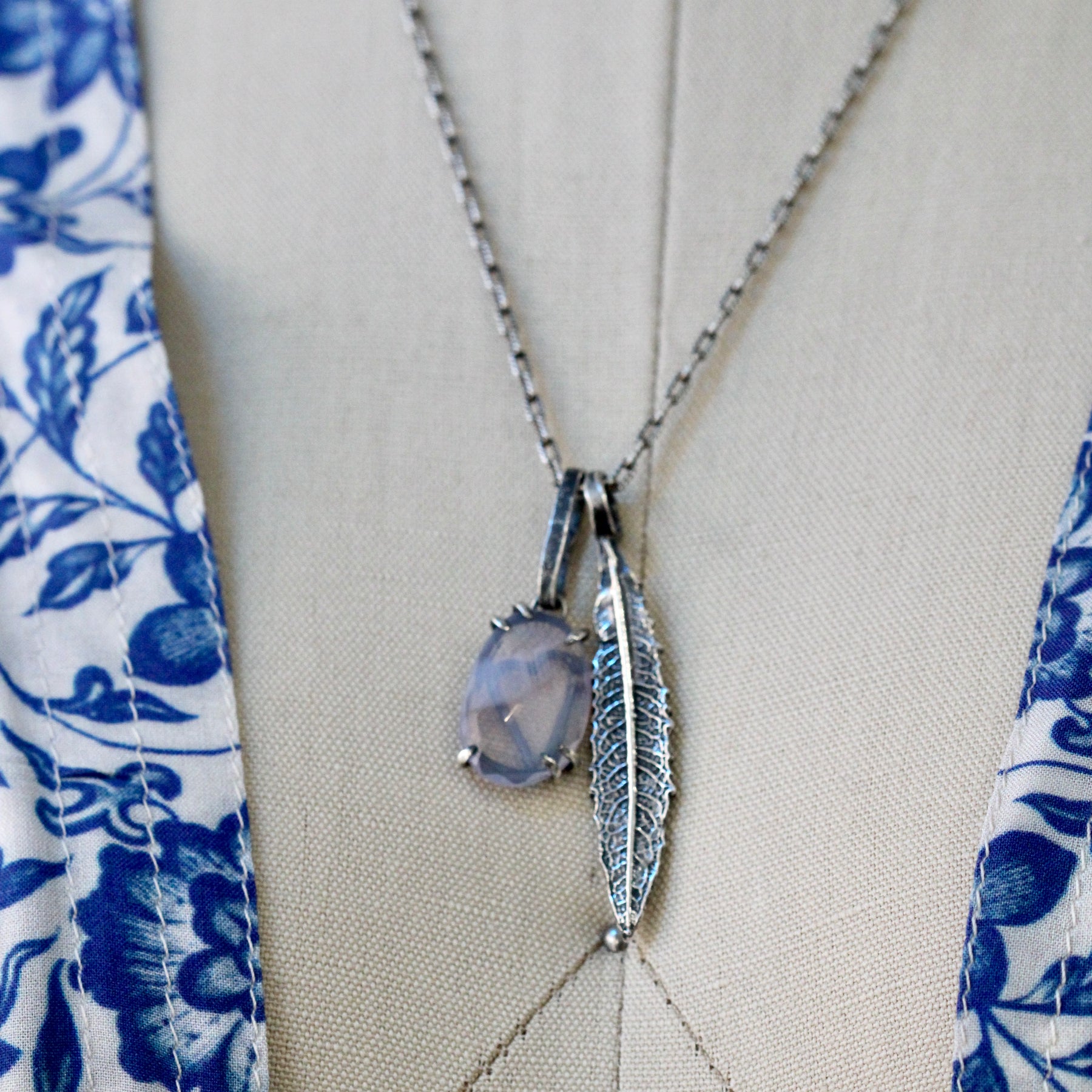 Rose cut Lavender Quartz prong set in sterling silver with heart detail