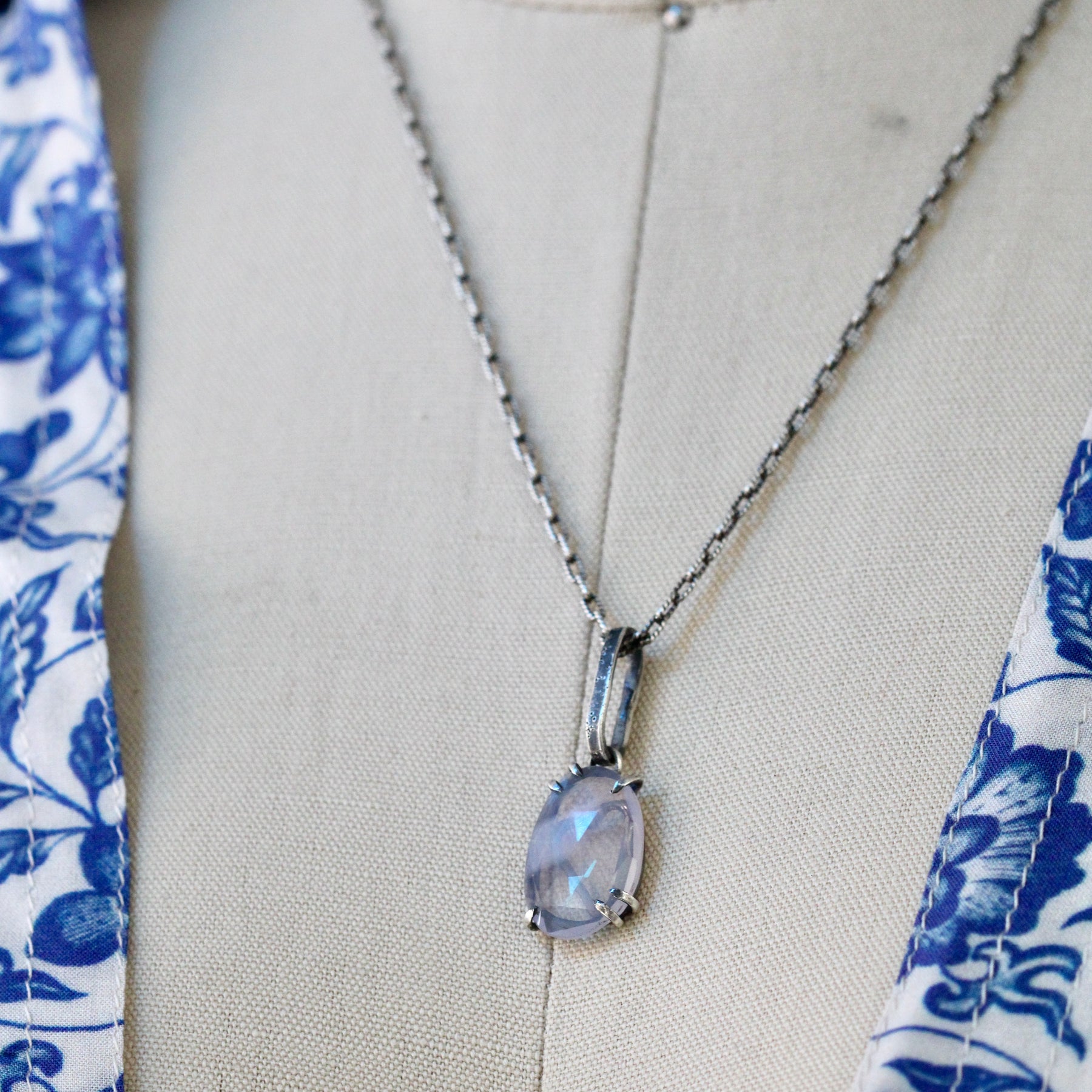 Rose cut Lavender Quartz prong set in sterling silver with heart detail