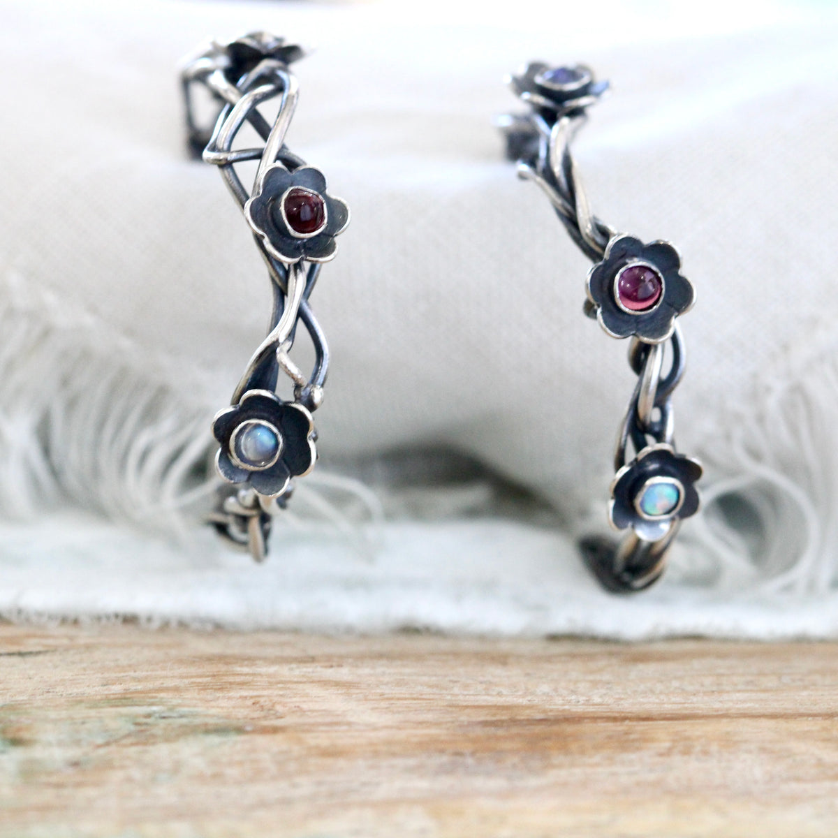 Kindred Woven Sterling Silver Hoop Earrings with Flowers and Gemstones