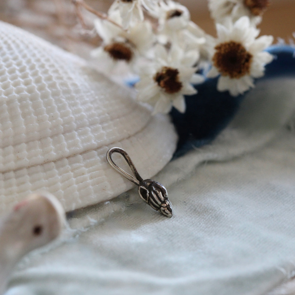 Tiny Whelk Sterling Silver Charm Pacific Coast Collection