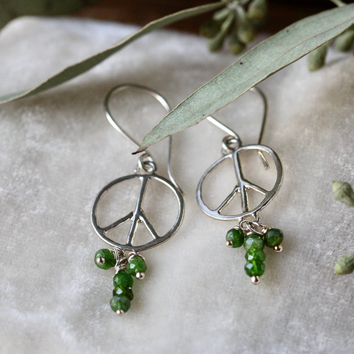 Peace symbol dangle earrings sterling and chrome dioposite
