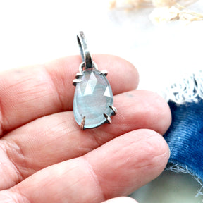 Rose cut Aquamarine prong set in sterling silver with heart detail