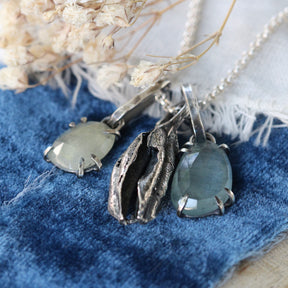 Rose cut Aquamarine prong set in sterling silver with heart detail