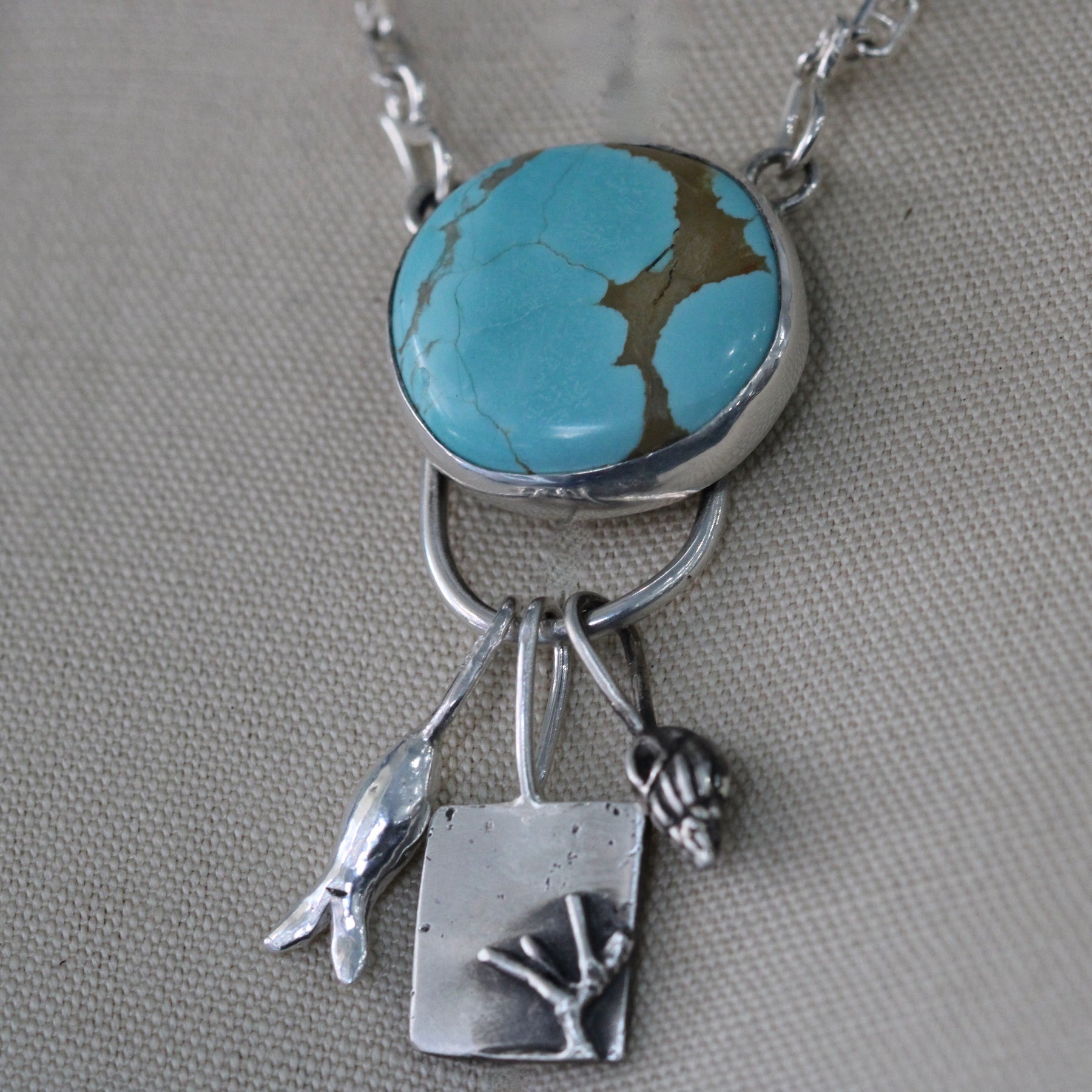 Tiny Whelk Sterling Silver Charm Pacific Coast Collection