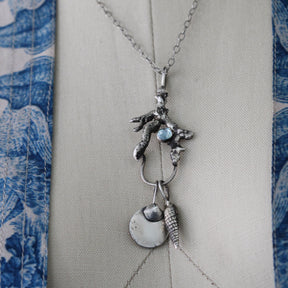 Long Spiral Shell with blue topaz Charm Pacific Coast Collection