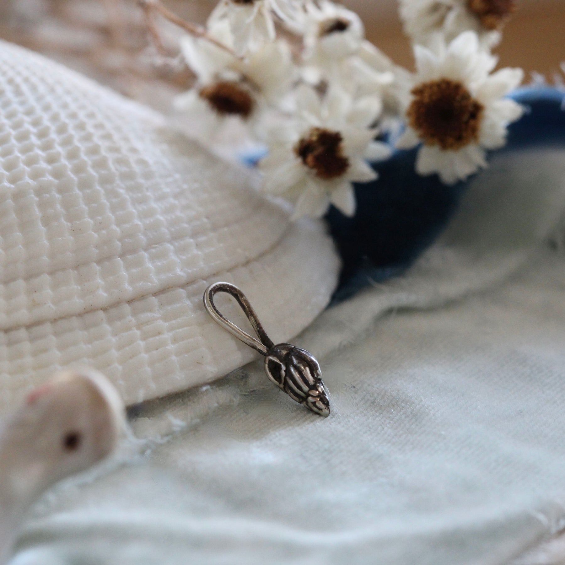 Tiny Whelk Sterling Silver Charm Pacific Coast Collection