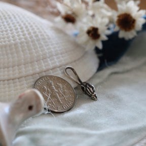 Tiny Whelk Sterling Silver Charm Pacific Coast Collection