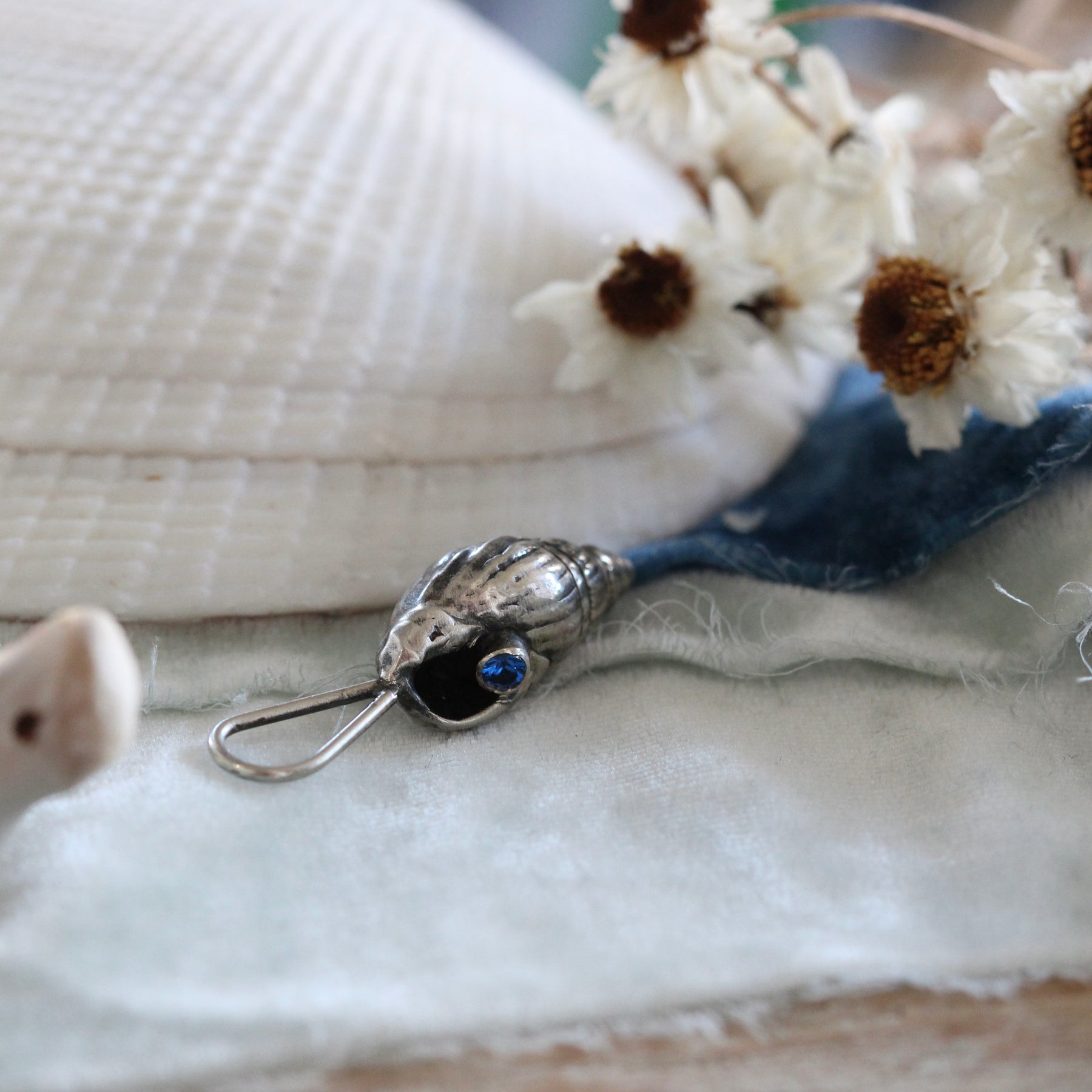 Coastal Spiral Shell Charm with blue zircon Pacific Coast Collection