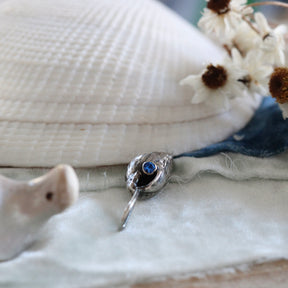 Coastal Spiral Shell Charm with blue zircon Pacific Coast Collection