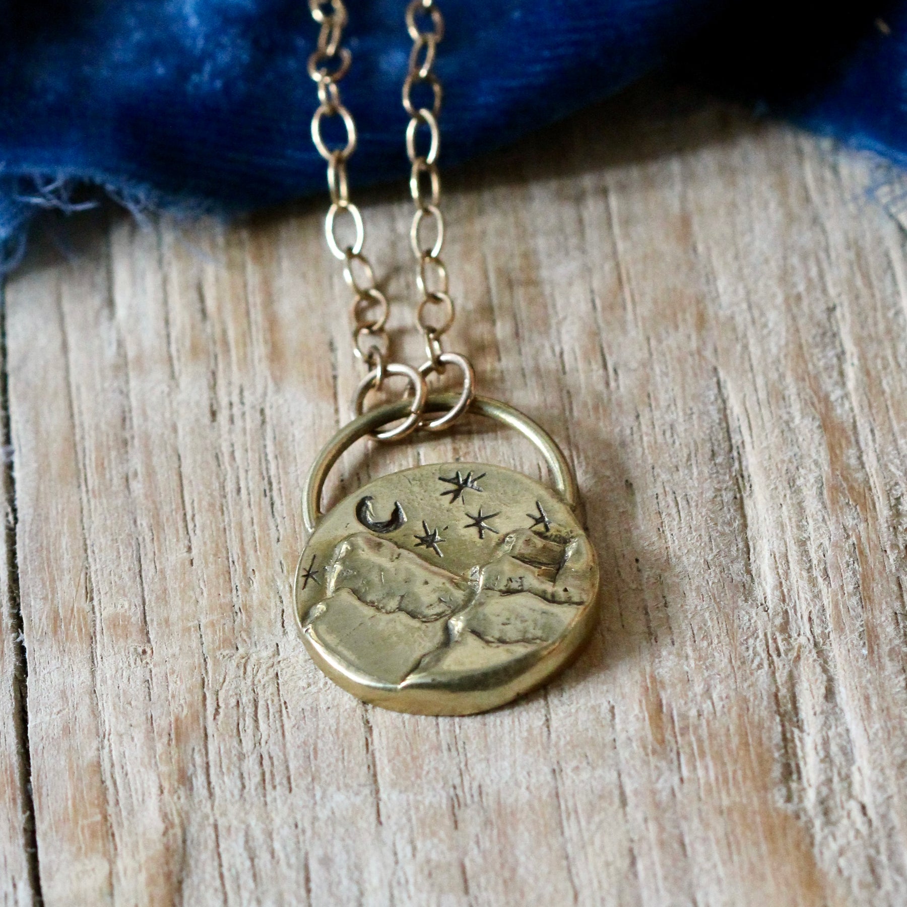 Mountains under night sky necklace cast in bronze ARCHIVE SALE