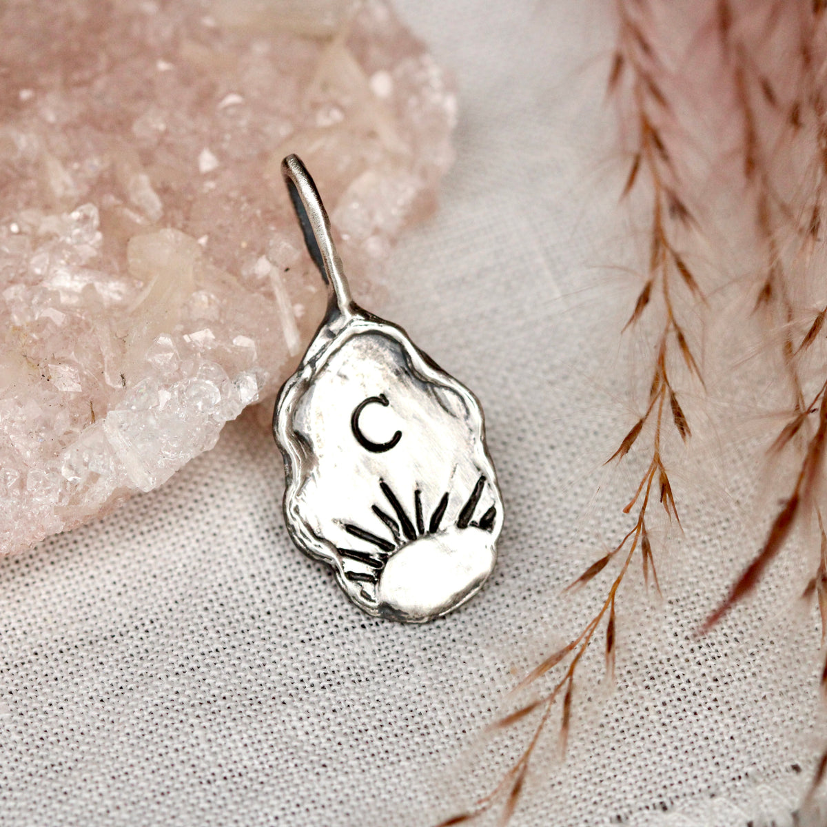 Rise sterling silver initial charm with sun
